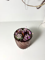 Žvakė stikliniame indelyje su gėlėmis